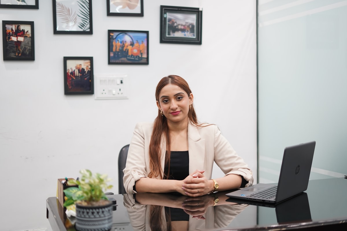 A businesswoman at her desk with a laptop